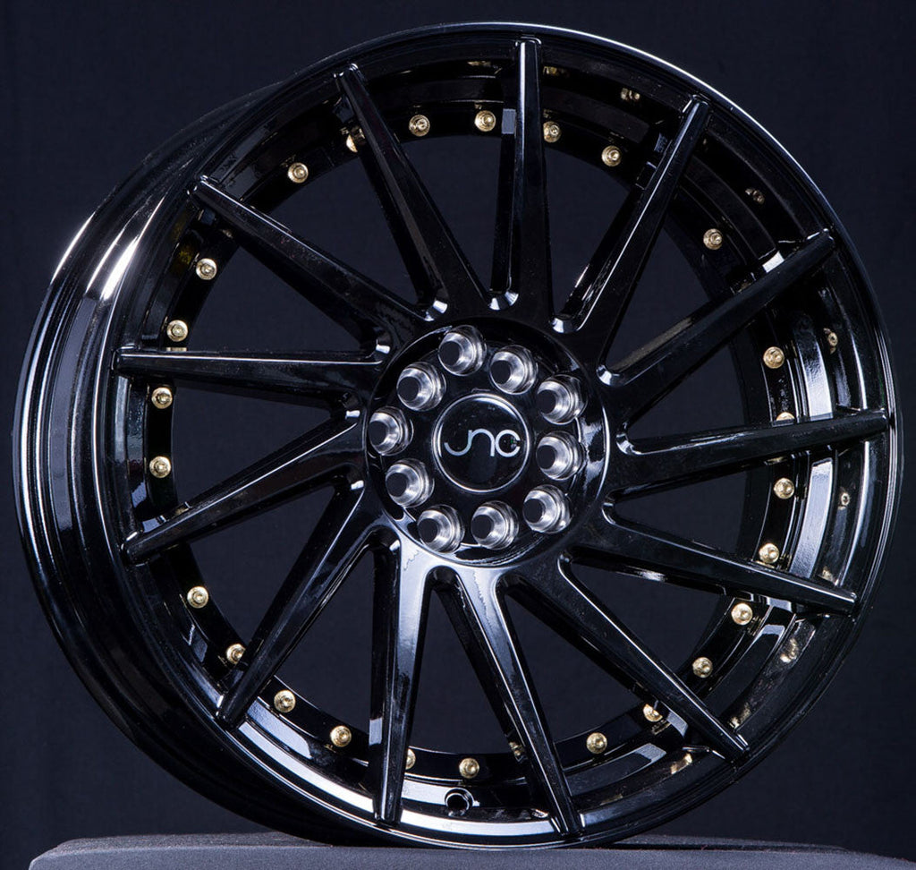 JNC051 Gloss Black w/ Gold Rivets wheel