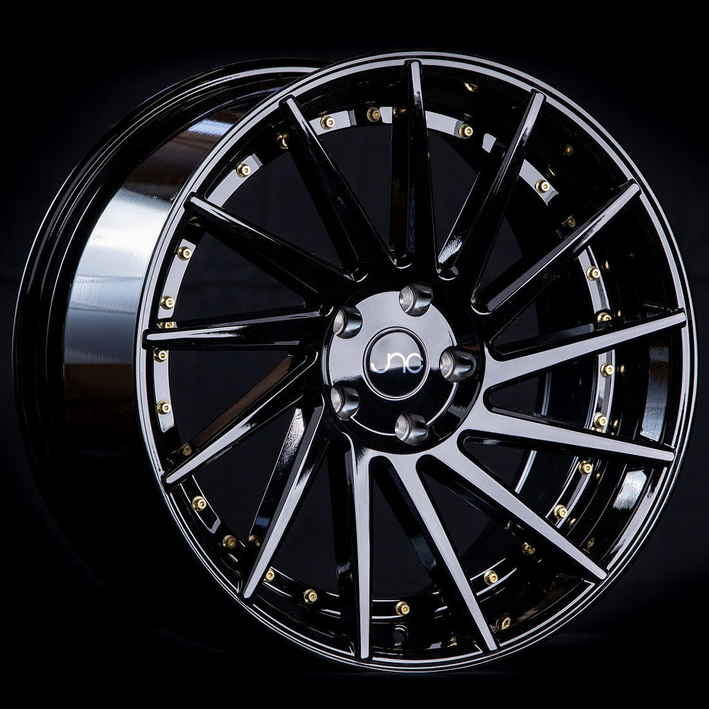 JNC051 Gloss Black w/ Gold Rivets wheel