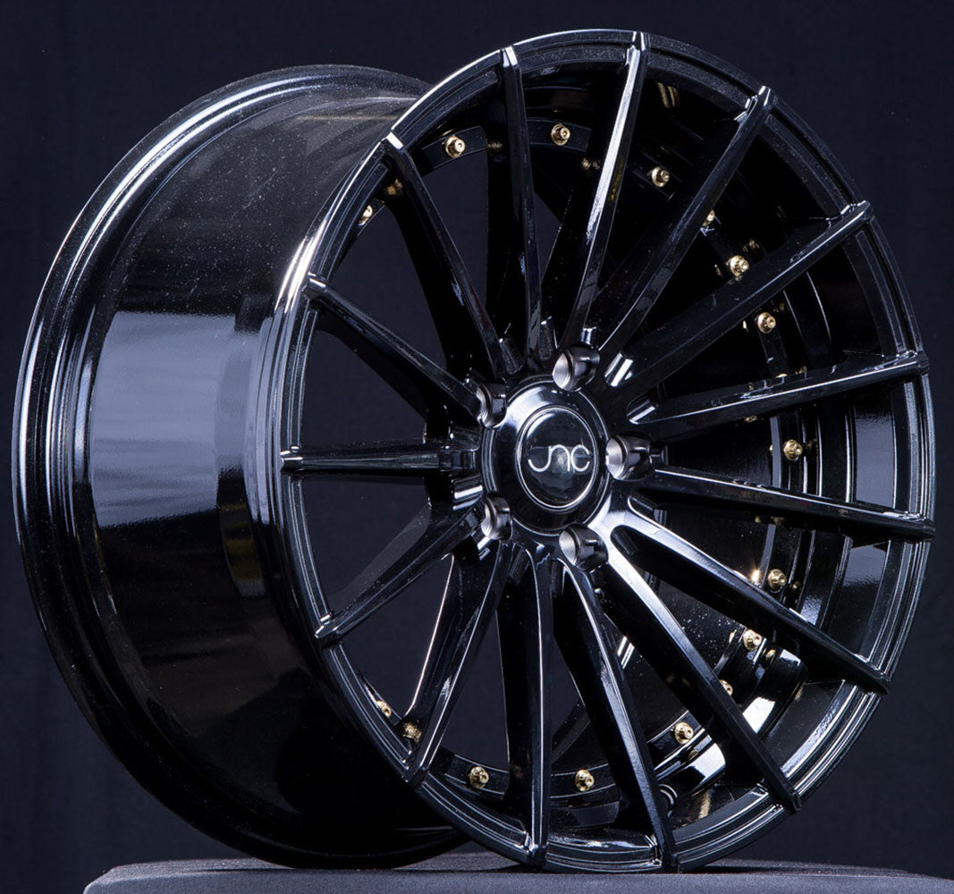 JNC042 Gloss Black w/ Gold Rivets wheel