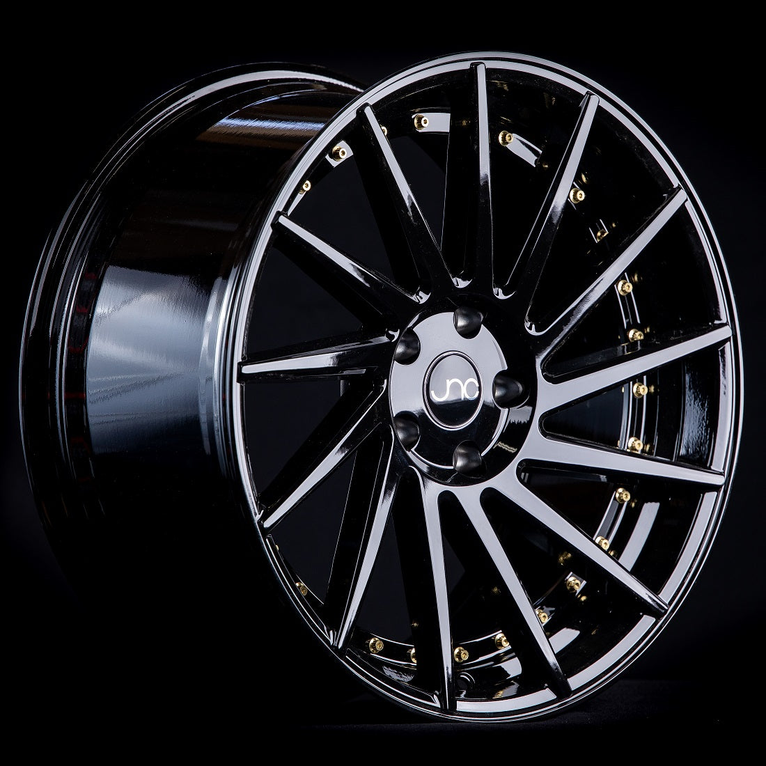 JNC051 Gloss Black w/ Gold Rivets wheel