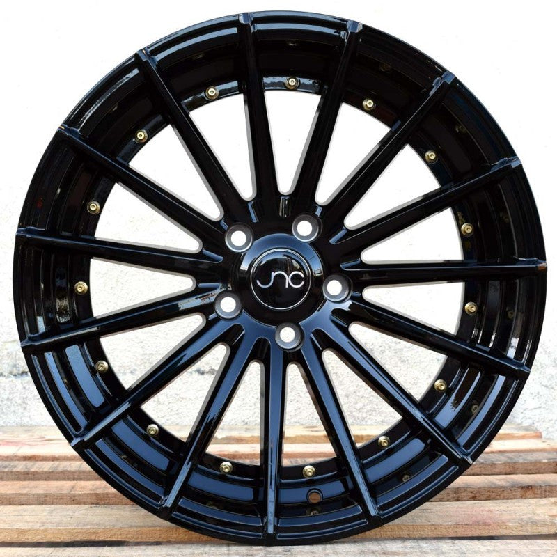 JNC042 Gloss Black w/ Gold Rivets wheel