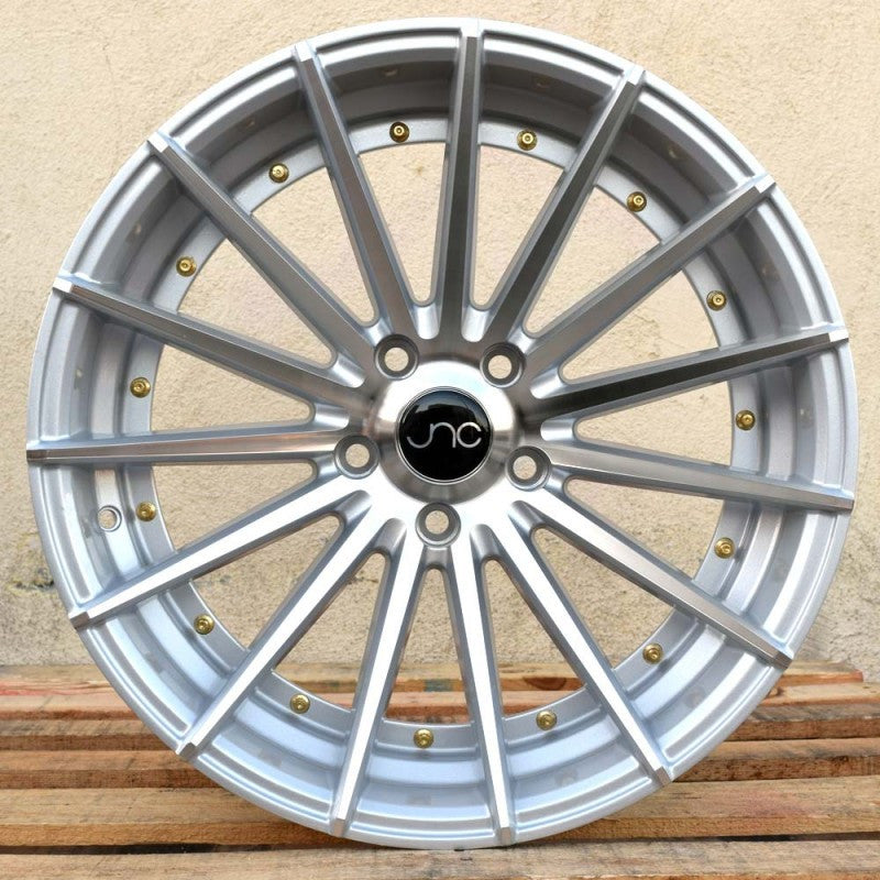 JNC042 Silver Machined Face w/ Gold Rivets wheel
