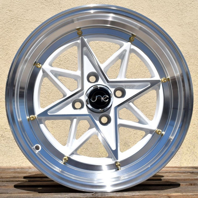 JNC025 White Machined Face Gold Rivets wheel