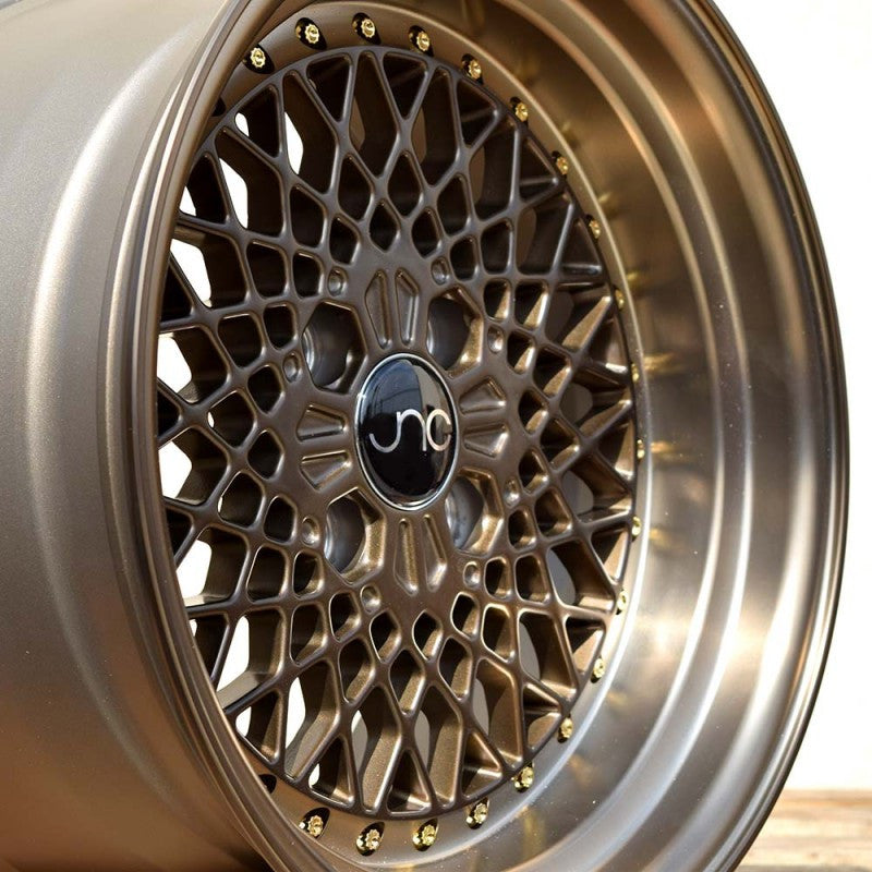 JNC045 Machined Bronze w/ Gold Rivets wheel