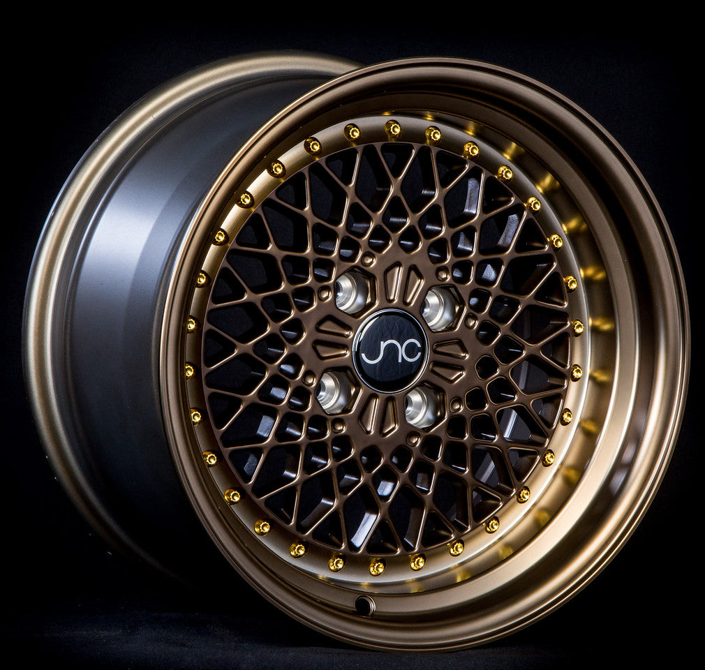 JNC045 Machined Bronze w/ Gold Rivets wheel