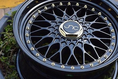 JNC004 Matte Black Gold Rivets wheel